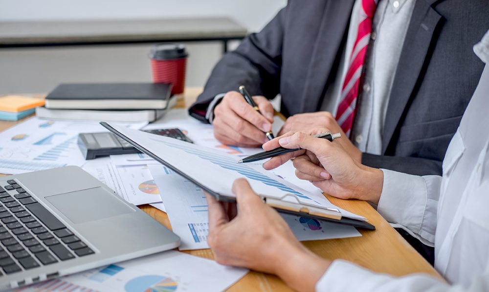Two business team discussing and planning strategy company growth project success financial statistics, Partner meeting professional investor working start up project for both company with document Two business team discussing and planning strategy company growth project success financial statistics, Partner meeting professional investor working start up project for both company with document.