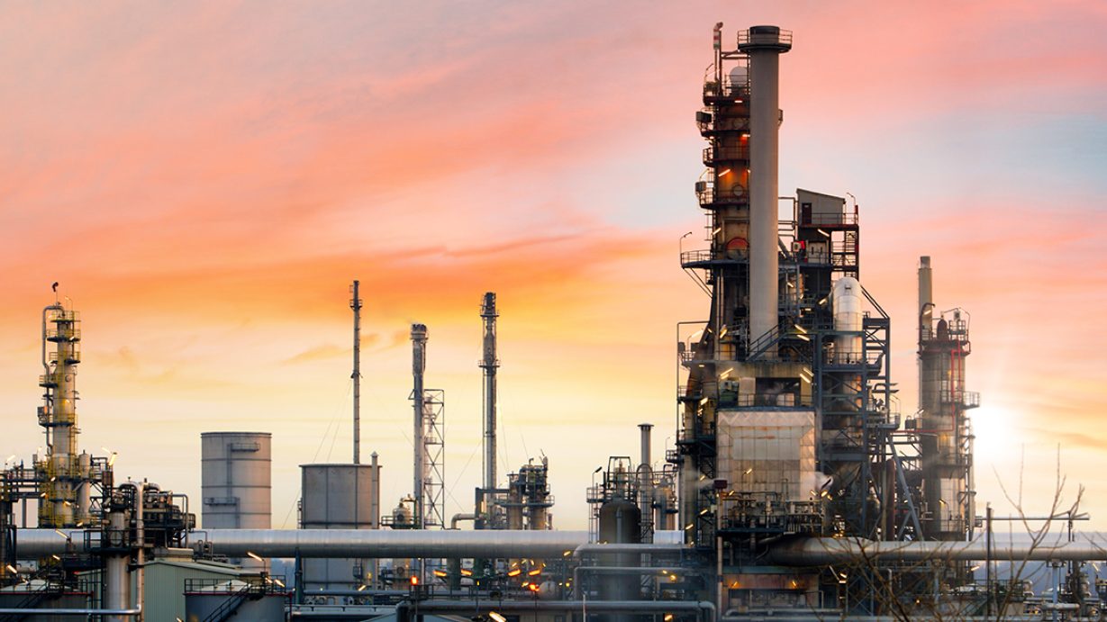 Oil refinery and plant and tower column of Petrochemistry industry in oil and gas industrial with cloud orange sky the sunrise background Oil refinery and plant and tower column of Petrochemistry industry in oil and gas industrial with cloud orange sky the sunrise background